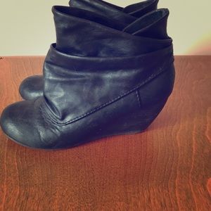 Black wedge boots
